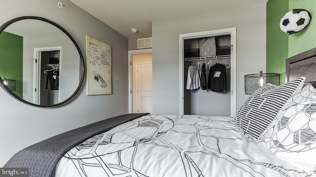 1203 Susan Cir, Breinigsville, PA 18031 - bedroom featuring a walk in closet, visible vents, and a closet