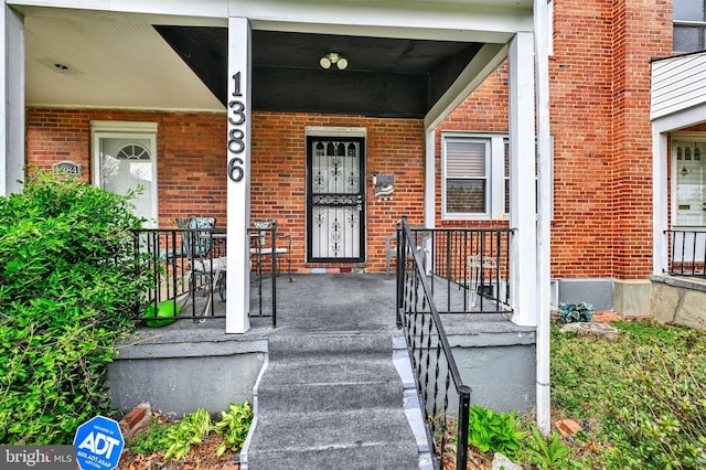 1386 Pentwood Rd, Baltimore, MD 21239 - view of exterior entry with brick siding and covered porch