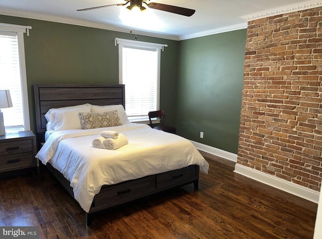 2202 E Cumberland St, Philadelphia, PA 19125 - bedroom with dark wood-style flooring, baseboards, brick wall, a ceiling fan, and crown molding
