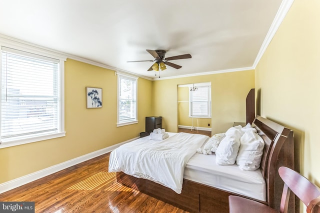 2202 E Cumberland St, Philadelphia, PA 19125 - bedroom with wood finished floors, baseboards, ornamental molding, and multiple windows