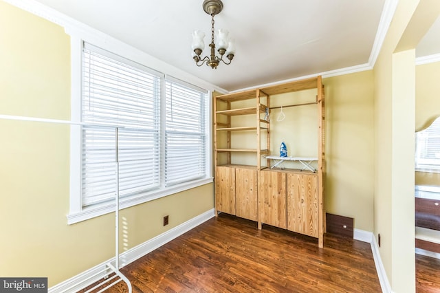 2202 E Cumberland St, Philadelphia, PA 19125 - interior space with baseboards, a chandelier, ornamental molding, and dark wood-style flooring