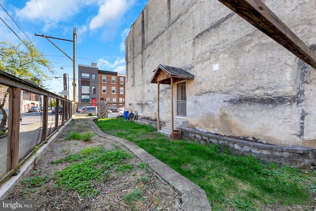 2202 E Cumberland St, Philadelphia, PA 19125 - view of side of property featuring entry steps and fence