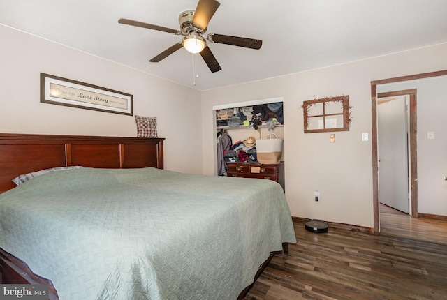 bedroom featuring ceiling fan, baseboards, wood finished floors, and a closet