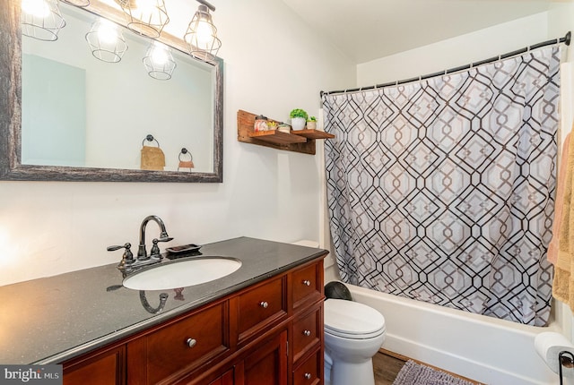 full bathroom featuring vanity, shower / bathtub combination with curtain, and toilet