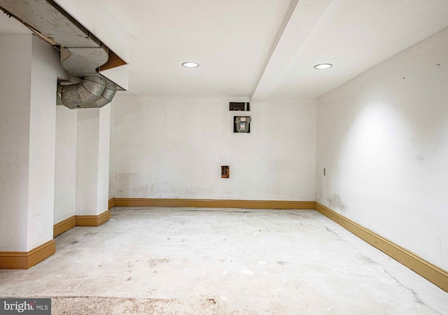 basement with baseboards and recessed lighting
