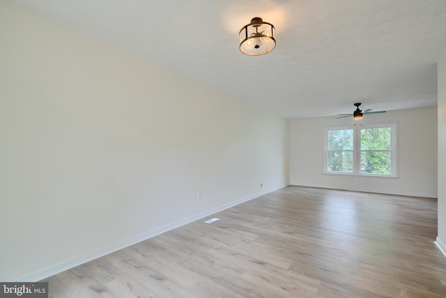 4504 E Joppa Rd, Perry Hall, MD 21128 - spare room featuring baseboards, light wood-style flooring, and ceiling fan