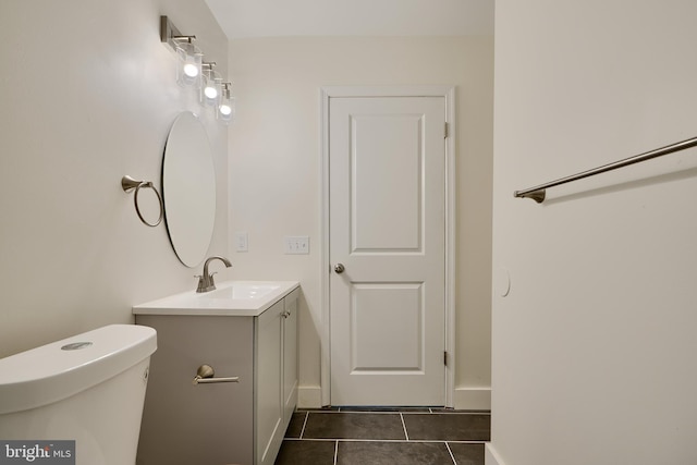 4504 E Joppa Rd, Perry Hall, MD 21128 - half bathroom featuring tile patterned floors, toilet, baseboards, and vanity