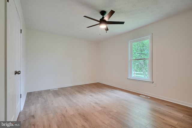 4504 E Joppa Rd, Perry Hall, MD 21128 - empty room featuring light wood finished floors, baseboards, a ceiling fan, and visible vents