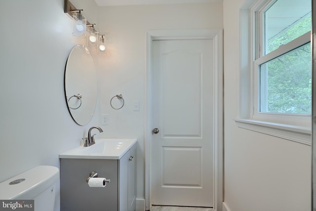4504 E Joppa Rd, Perry Hall, MD 21128 - half bath with plenty of natural light, toilet, and vanity