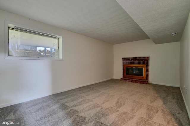 4504 E Joppa Rd, Perry Hall, MD 21128 - unfurnished living room with carpet, a textured ceiling, visible vents, and a brick fireplace