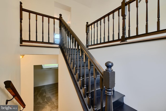 4504 E Joppa Rd, Perry Hall, MD 21128 - stairway featuring a towering ceiling and carpet floors