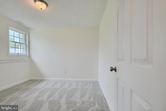 4504 E Joppa Rd, Perry Hall, MD 21128 - spare room with a textured ceiling, baseboards, visible vents, and carpet floors