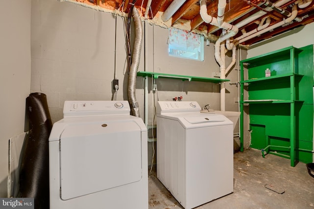4504 E Joppa Rd, Perry Hall, MD 21128 - washroom featuring washing machine and clothes dryer, laundry area, and concrete block wall