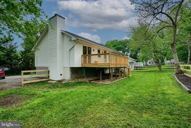 4504 E Joppa Rd, Perry Hall, MD 21128 - rear view of house featuring a chimney, a yard, fence, stairs, and a wooden deck