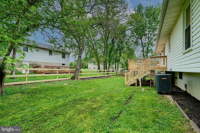 4504 E Joppa Rd, Perry Hall, MD 21128 - view of yard with fence, stairs, central AC, and a deck