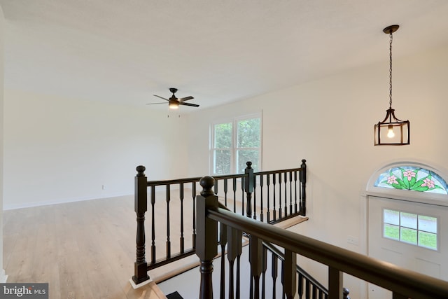 4504 E Joppa Rd, Perry Hall, MD 21128 - hall with baseboards, an upstairs landing, and wood finished floors