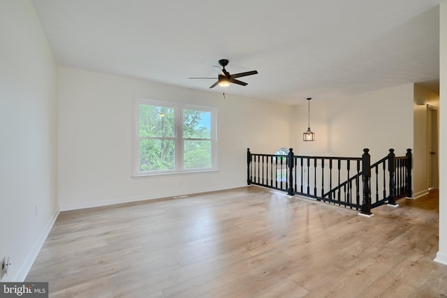 4504 E Joppa Rd, Perry Hall, MD 21128 - empty room with baseboards, a ceiling fan, and wood finished floors