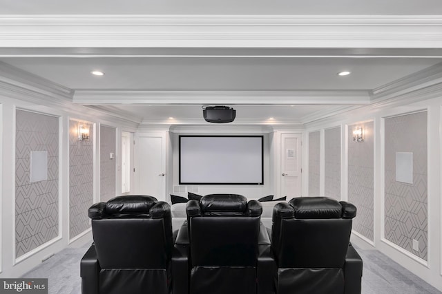 carpeted home theater room featuring recessed lighting and ornamental molding
