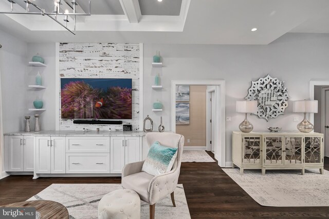 living area with baseboards, dark wood-style floors, recessed lighting, and a chandelier