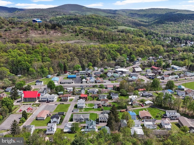 bird's eye view with a mountain view, a residential view, and a forest view