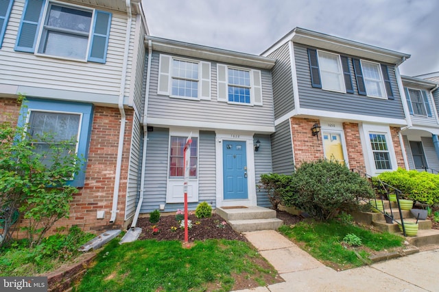 multi unit property with brick siding