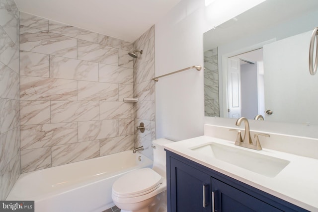 bathroom featuring shower / bath combination, vanity, and toilet