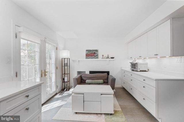 2564 S Arlington Mill Dr S Unit 5, Arlington, VA 22206 - bedroom featuring a fireplace, french doors, a toaster, and access to exterior
