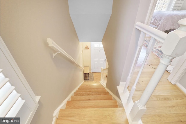 2564 S Arlington Mill Dr S Unit 5, Arlington, VA 22206 - staircase with baseboards and wood finished floors