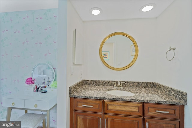 2564 S Arlington Mill Dr S Unit 5, Arlington, VA 22206 - bathroom with wallpapered walls and vanity