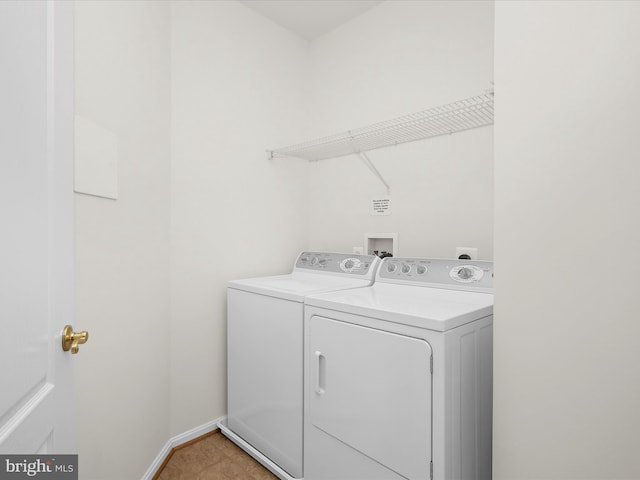 laundry area featuring laundry area and washer and clothes dryer