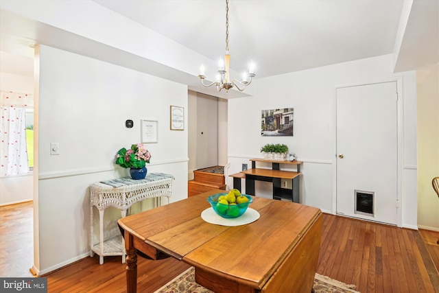1223 Summerwood Ct, Arnold, MD 21012 - dining space with wood-type flooring, baseboards, and a notable chandelier