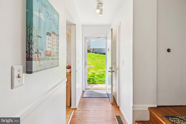1223 Summerwood Ct, Arnold, MD 21012 - doorway to outside with light wood-style floors, visible vents, and baseboards