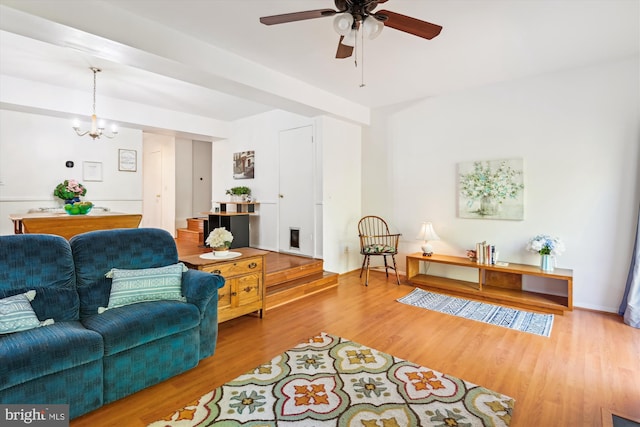 1223 Summerwood Ct, Arnold, MD 21012 - living area featuring wood finished floors and ceiling fan with notable chandelier