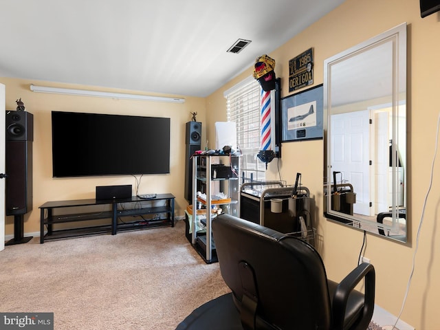 home office featuring carpet floors and visible vents