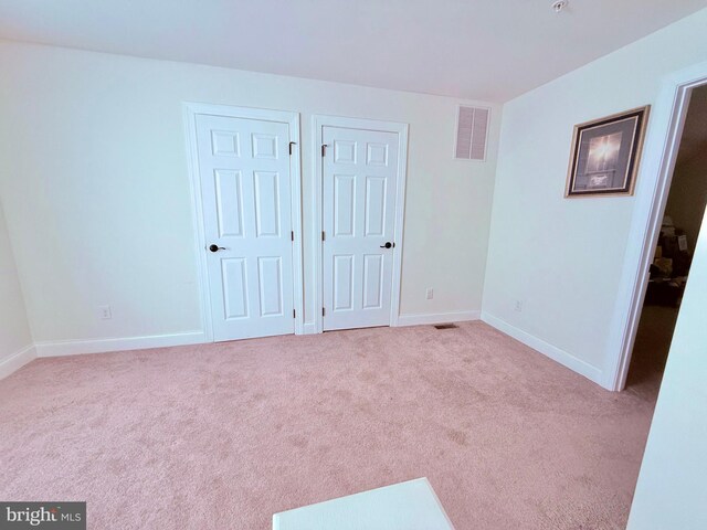 123 Briarwood Cir, Denton, MD 21629 - unfurnished bedroom featuring carpet floors, baseboards, and visible vents