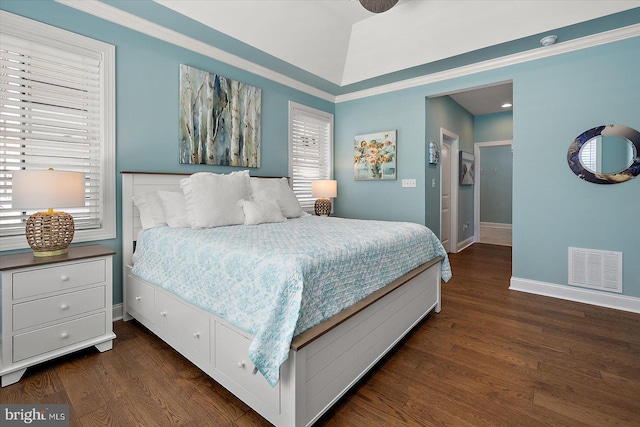 bedroom featuring baseboards, visible vents, and dark wood-style flooring
