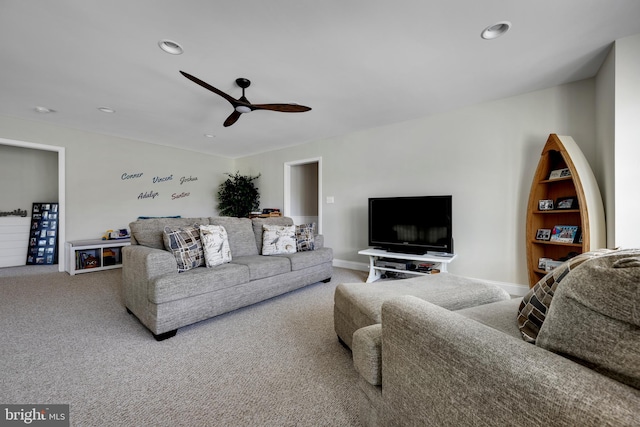 living room with recessed lighting, ceiling fan, baseboards, and carpet
