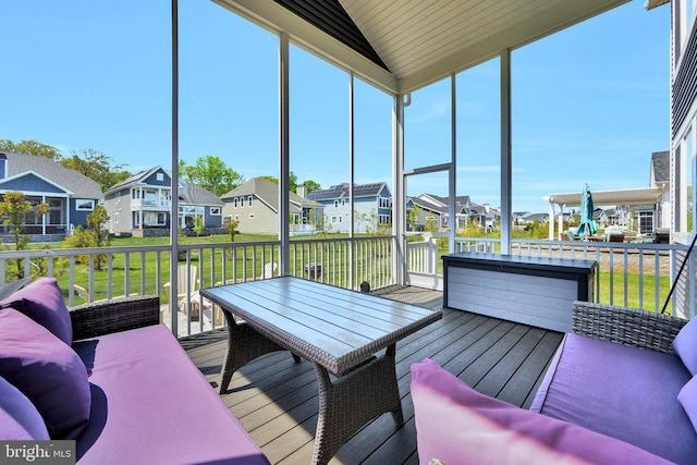 sunroom with a residential view