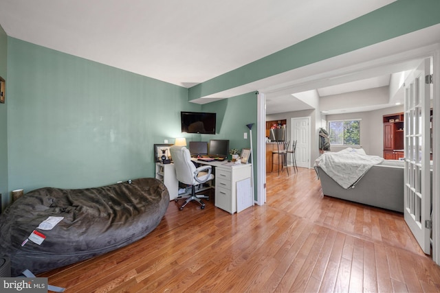 bedroom featuring light wood-style floors