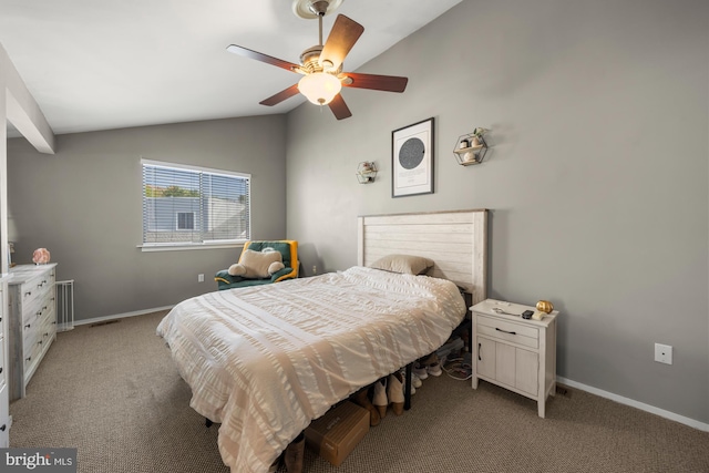 bedroom featuring lofted ceiling, light carpet, a ceiling fan, and baseboards
