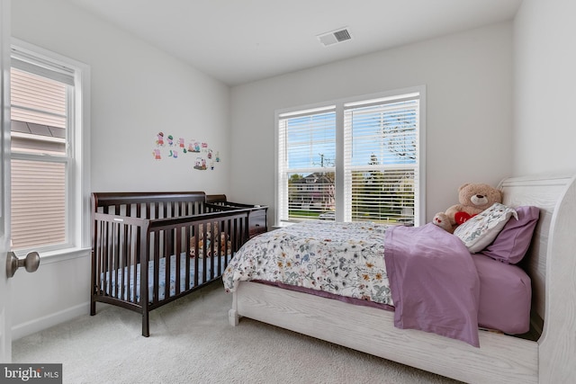 625 E G St, Purcellville, VA 20132 - carpeted bedroom with baseboards and visible vents