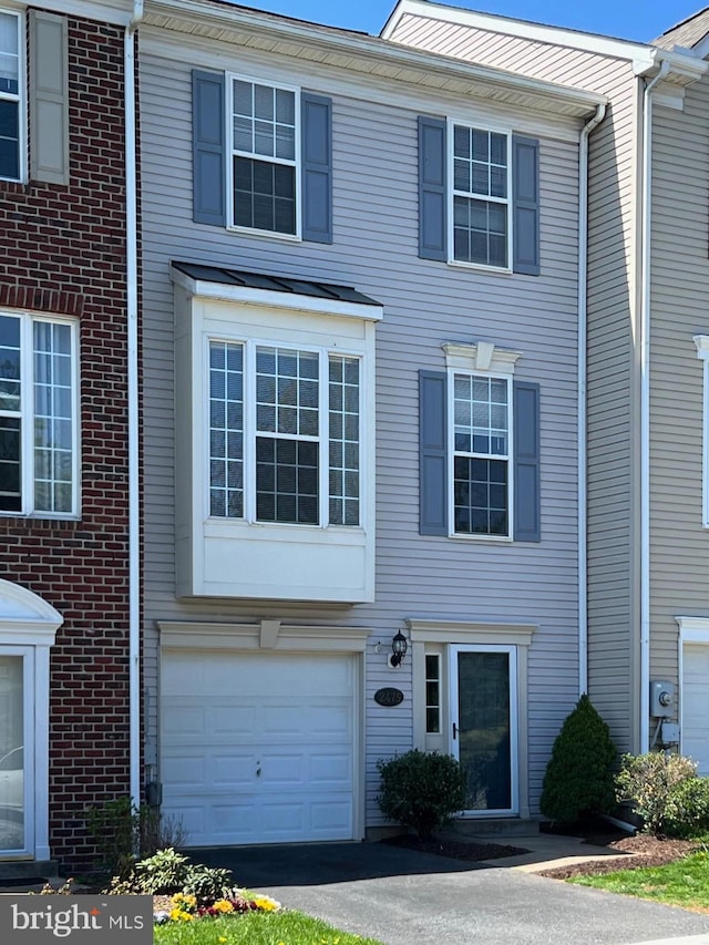 2475 Lakeside Dr, Frederick, MD 21702 - multi unit property featuring brick siding, driveway, and a garage