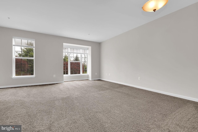 2475 Lakeside Dr, Frederick, MD 21702 - spare room featuring baseboards and carpet floors