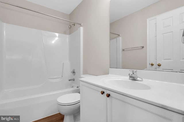 2475 Lakeside Dr, Frederick, MD 21702 - bathroom with toilet, vanity, wood finished floors, and  shower combination