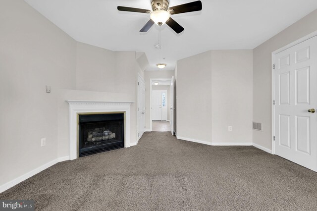 2475 Lakeside Dr, Frederick, MD 21702 - unfurnished living room with carpet floors, visible vents, a ceiling fan, and baseboards