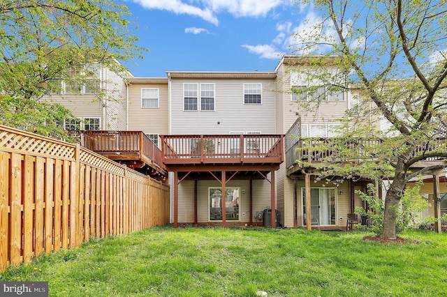 2475 Lakeside Dr, Frederick, MD 21702 - back of property with fence, a lawn, and a deck