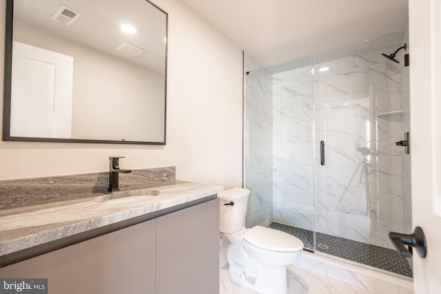 bathroom featuring visible vents, marble finish floor, a marble finish shower, and toilet