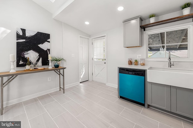 kitchen featuring a sink, light countertops, dishwasher, recessed lighting, and gray cabinets
