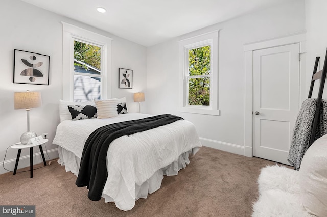 carpeted bedroom with recessed lighting and baseboards
