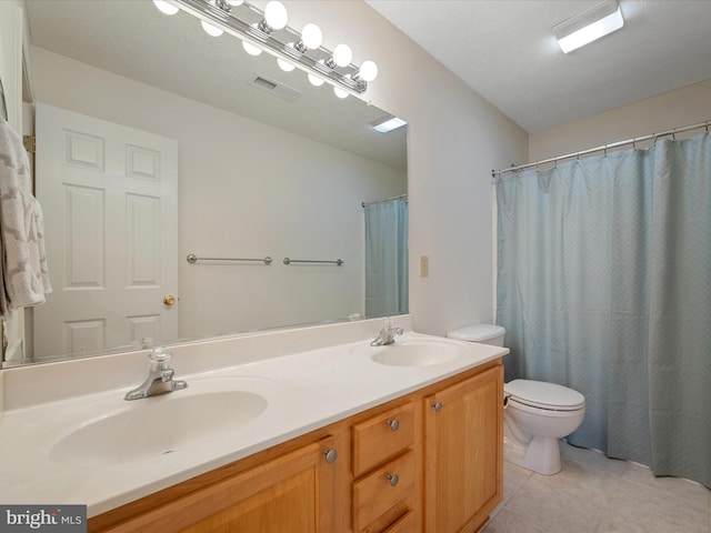 311 Clydesdale Dr, Stephens City, VA 22655 - bathroom with tile patterned flooring, toilet, and double vanity